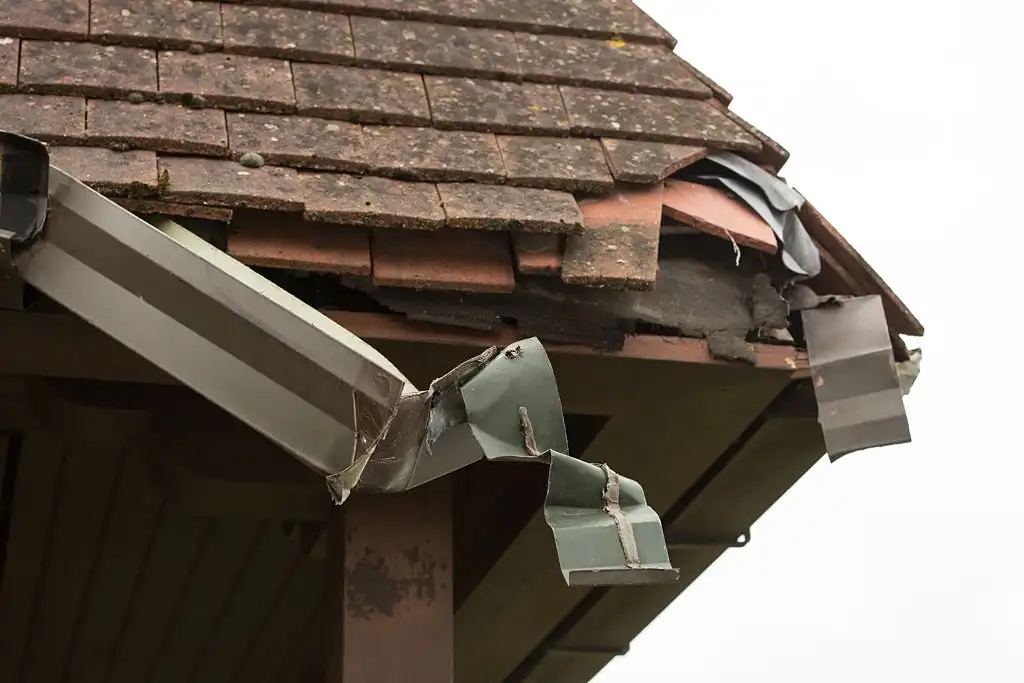 damage to gutter from storm in baton rouge