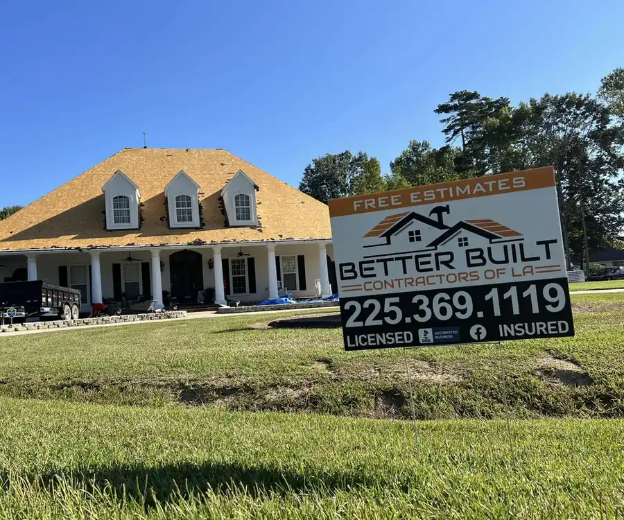 better built contractors new sign in front of roofing project in baton rouge