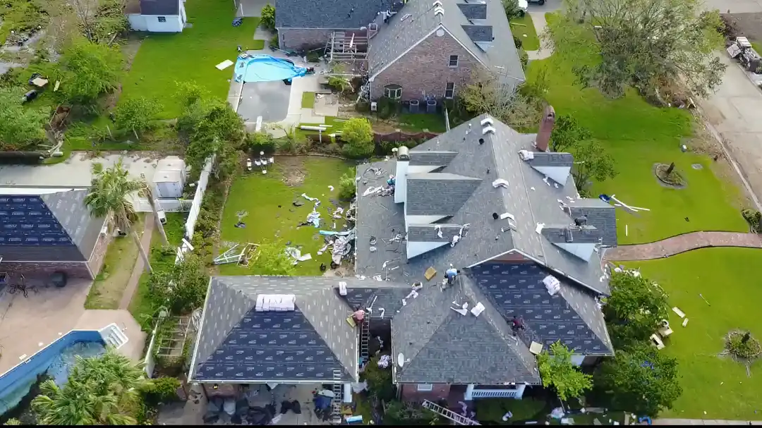 overhead view of hurricane damage roof repair in louisiana