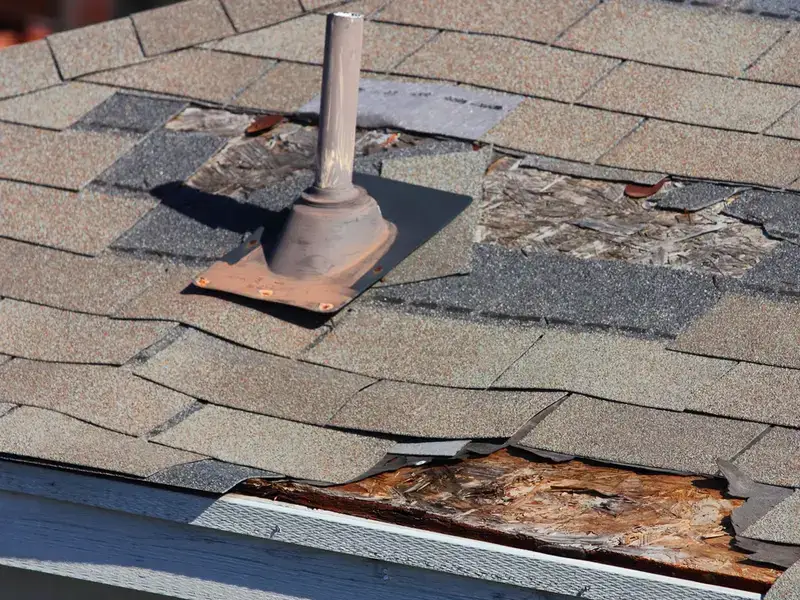 badly deteriorated shingle roof missing shingles bad ventilation system