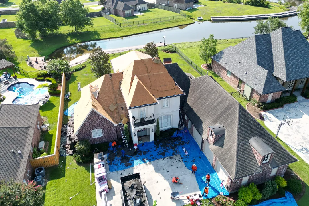 overhead drone view McIntyre Family Residence Owens Corning Duration Driftwood Roofing before crews tearing off old roof