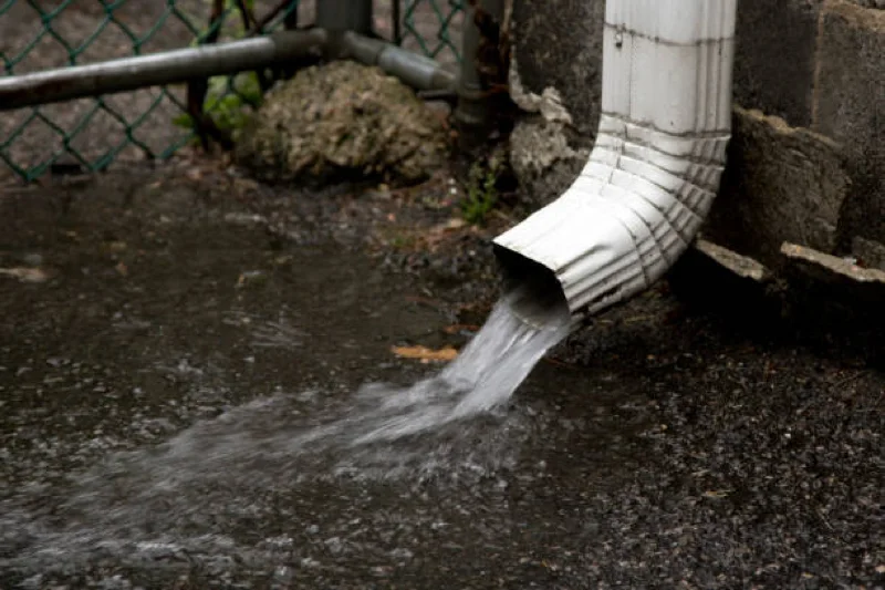 drain spout during rain storm